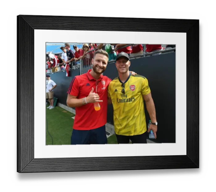 Framed Print : Surprise Encounter: Christian McCaffrey Meets Arsenal's Shkodran Mustafi at 2019 International Champions Cup in Charlotte Framed Print : Surprise Encounter: Christian McCaffrey Meets Arsenal's Shkodran Mustafi at 2019 International Champions Cup in Charlotte
