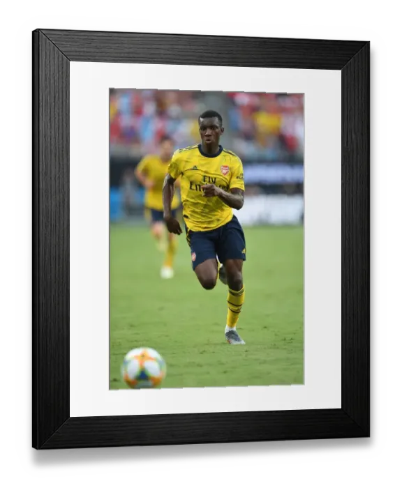 Framed Print : Arsenal's Eddie Nketiah Shines: Arsenal vs. ACF Fiorentina in 2019 International Champions Cup, Charlotte Framed Print : Arsenal's Eddie Nketiah Shines: Arsenal vs. ACF Fiorentina in 2019 International Champions Cup, Charlotte