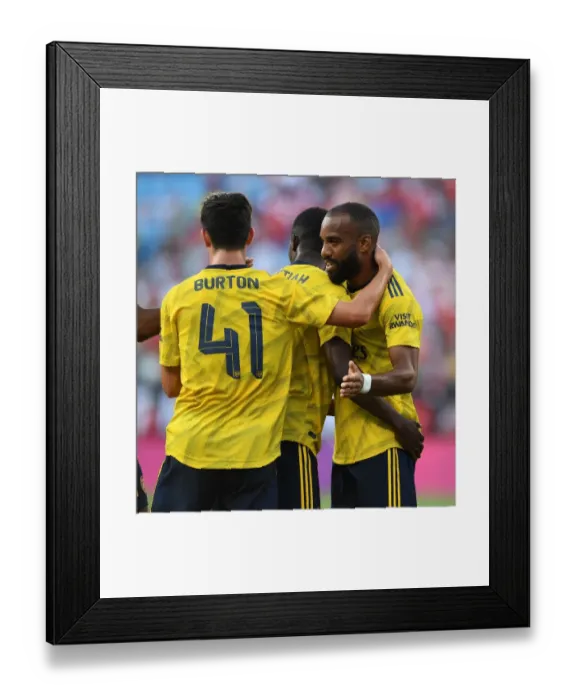 Framed Print : Arsenal's Double Act: Nketiah and Lacazette Celebrate Goals Against Fiorentina in 2019 International Champions Cup