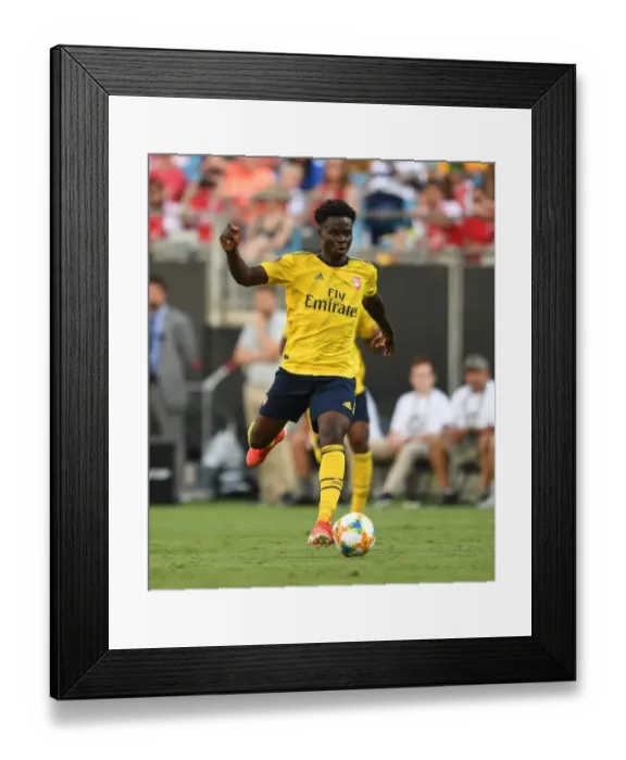 Framed Print : Arsenal's Bukayo Saka Shines in 2019 International Champions Cup Clash Against ACF Fiorentina