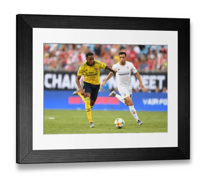 Framed Print : Arsenal vs. Fiorentina Clash in 2019 International Champions Cup, Charlotte: Joe Willock Faces Jaime Baez Framed Print : Arsenal vs. Fiorentina Clash in 2019 International Champions Cup, Charlotte: Joe Willock Faces Jaime Baez