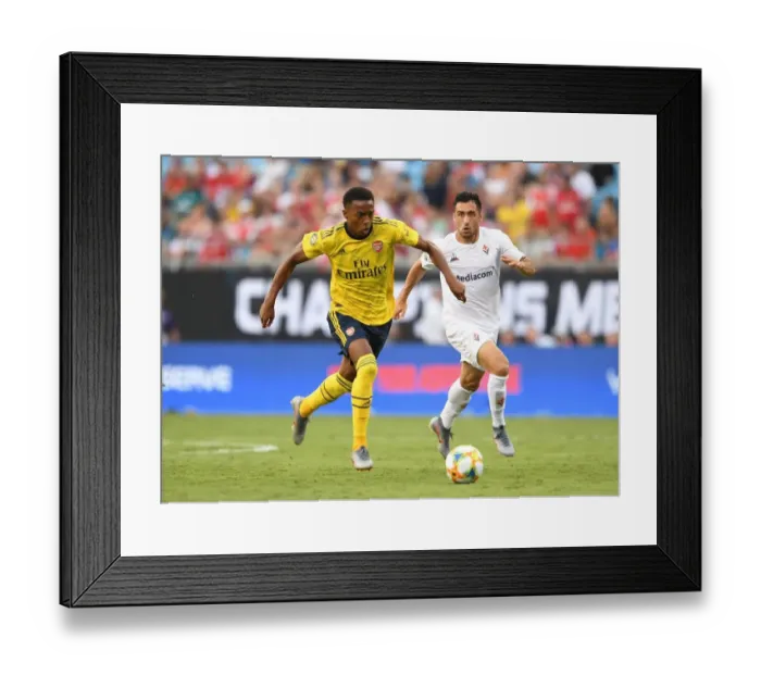 Framed Print : Arsenal's Joe Willock vs. Fiorentina's Jaime Baez: A Battle in the International Champions Cup, Charlotte 2019 Framed Print : Arsenal's Joe Willock vs. Fiorentina's Jaime Baez: A Battle in the International Champions Cup, Charlotte 2019