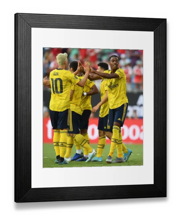 Framed Print : Arsenal's Joe Willock and Mesut Ozil Celebrate Goal Against ACF Fiorentina in 2019 International Champions Cup, Charlotte Framed Print : Arsenal's Joe Willock and Mesut Ozil Celebrate Goal Against ACF Fiorentina in 2019 International Champions Cup, Charlotte