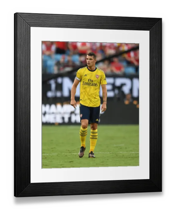 Framed Print : Granit Xhaka: Arsenal Star in Action against ACF Fiorentina at 2019 International Champions Cup, Charlotte