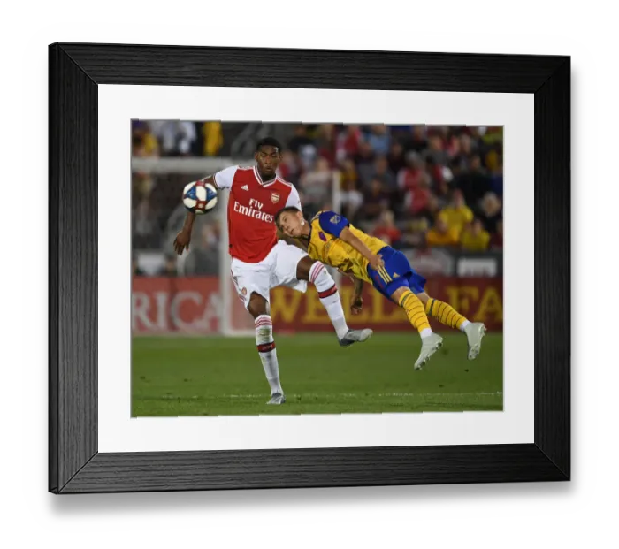 Framed Print : Arsenal FC Training in Colorado: Zech Medley Faces Off Against Colorado Rapids