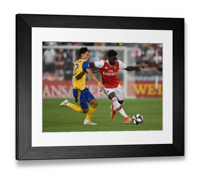 Framed Print : Arsenal's Bukayo Saka in Action: Pre-Season Clash Against Colorado Rapids (2019-20)