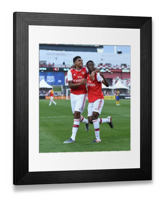 Framed Print : Arsenal Double Strike: Olayinka and John-Jules Celebrate Goalscoring Moment vs Colorado Rapids (2019)