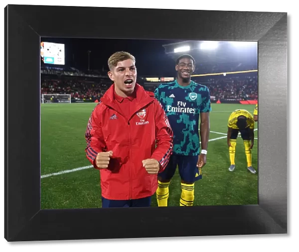 Arsenal's Emile Smith Rowe and Zech Medley Celebrate Victory over Bayern Munich