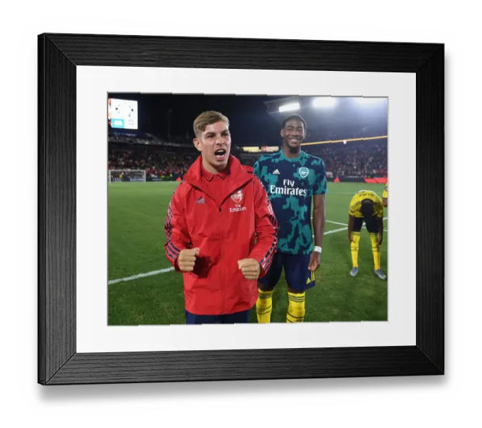Framed Print : Arsenal's Emile Smith Rowe and Zech Medley Celebrate Victory over Bayern Munich