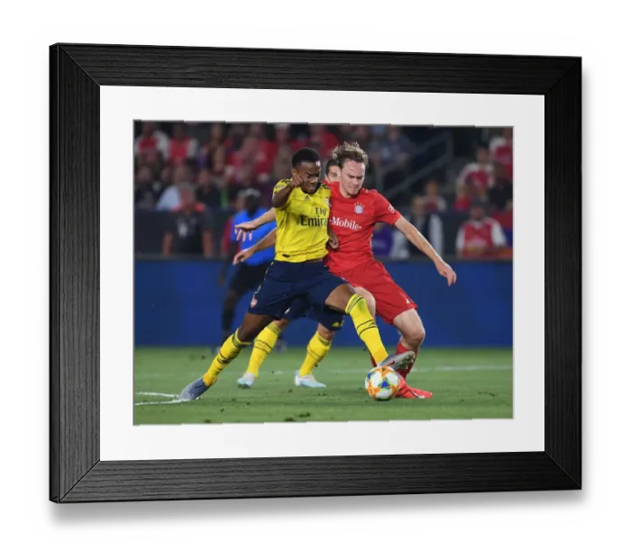 Framed Print : Arsenal vs. Bayern Munich: International Champions Cup Clash at Dignity Health Sports Park, 2019 - A Battle Between Arsenal's Joe Willock and Bayern's Javi Bernat
