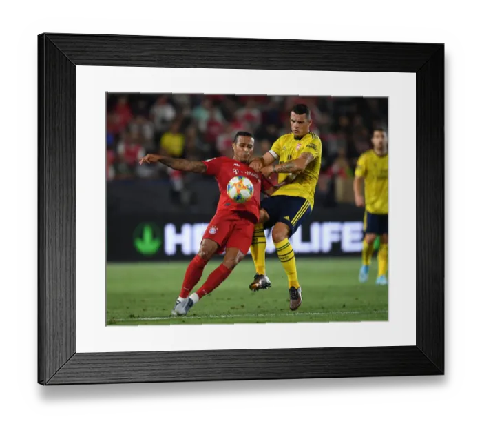 Framed Print : Arsenal vs. Bayern Munich: Xhaka vs. Coman - Intense Showdown at International Champions Cup Framed Print : Arsenal vs. Bayern Munich: Xhaka vs. Coman - Intense Showdown at International Champions Cup