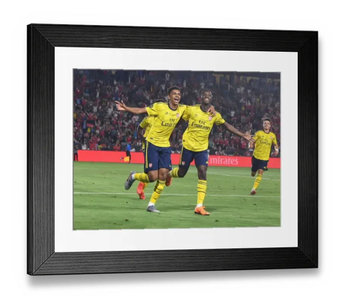 Framed Print : Arsenal Celebrate as Nketiah Scores Second Goal Against Bayern Munich in 2019 International Champions Cup