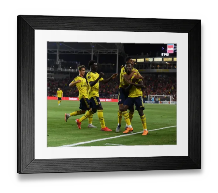 Framed Print : Arsenal's Nketiah and John-Jules: Celebrating Their Goals Against FC Bayern Munich in the 2019 International Champions Cup