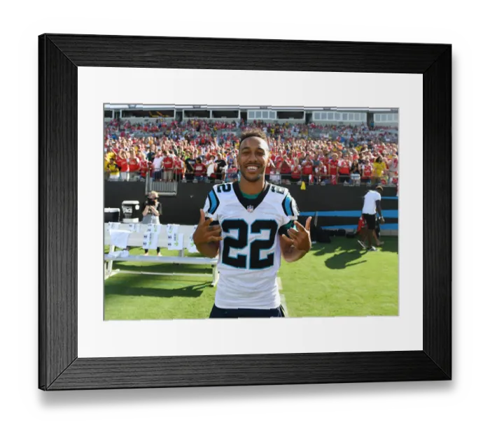 Framed Print : Arsenal's Aubameyang Receives Carolina Panthers Shirt from Christian McCaffrey Ahead of Arsenal v Fiorentina Match, 2019