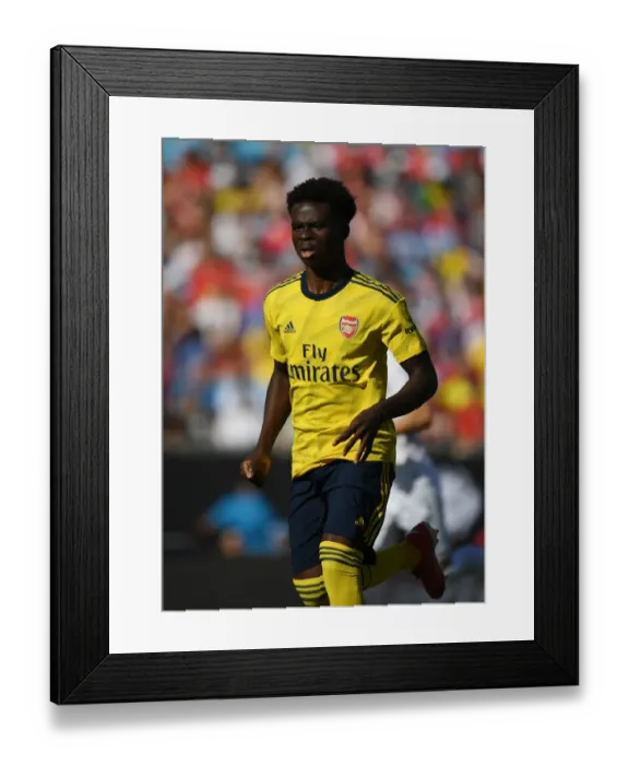 Framed Print : Arsenal's Saka Stands Out: Arsenal vs. Fiorentina, 2019 International Champions Cup, Charlotte Framed Print : Arsenal's Saka Stands Out: Arsenal vs. Fiorentina, 2019 International Champions Cup, Charlotte