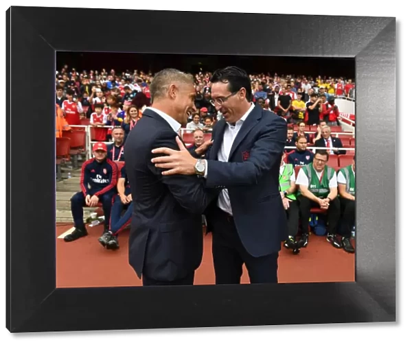 Arsenal's Unai Emery and Olympique Lyonnais Silvinho: A Pre-Match Encounter at the Emirates Cup 2019