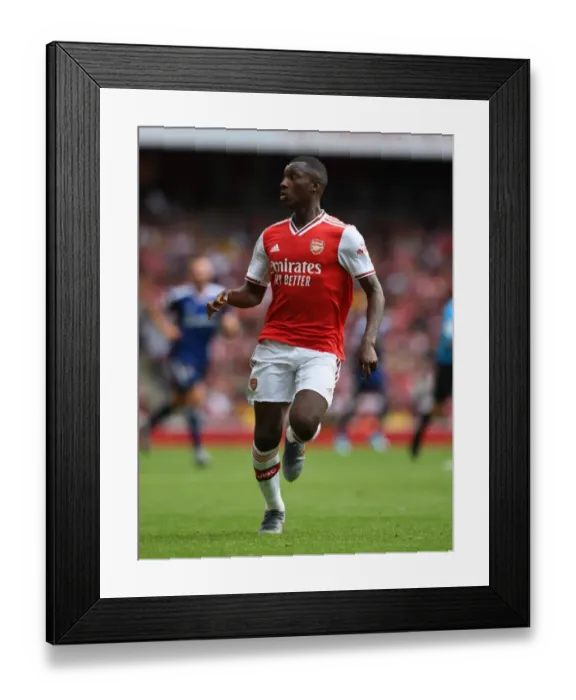 Framed Print : Arsenal's Eddie Nketiah Shines in Emirates Cup Clash against Olympique Lyonnais Framed Print : Arsenal's Eddie Nketiah Shines in Emirates Cup Clash against Olympique Lyonnais