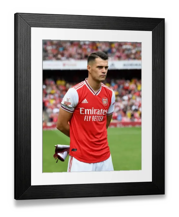 Framed Print : Arsenal's Granit Xhaka Prepares for Arsenal v Olympique Lyonnais at Emirates Cup, 2019
