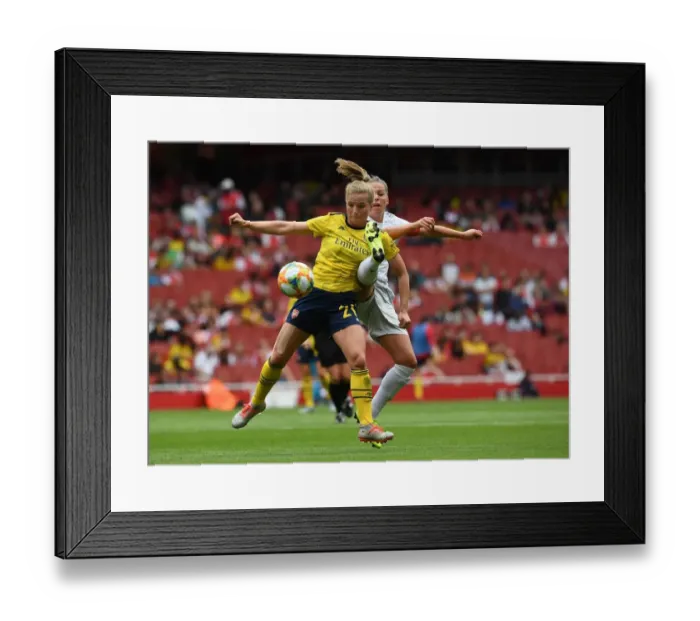Framed Print : Clash of Midfield Titans: Tabea Kemme vs. Melanie Leupolz at the Emirates Cup