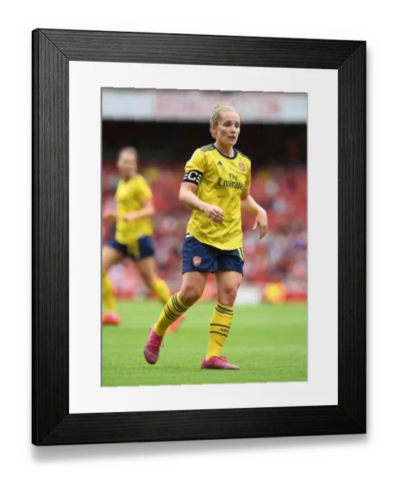 Framed Print : Arsenal's Kim Little Goes Head-to-Head with FC Bayern Munich at Emirates Cup