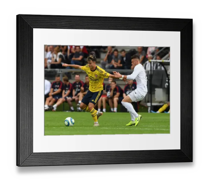 Framed Print : Arsenal's Robbie Burton in Action during Pre-Season Friendly against Angers