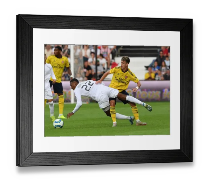 Framed Print : Arsenal vs Angers: Robbie Burton Challenges Jeff Reine-Adelaide in Pre-Season Friendly