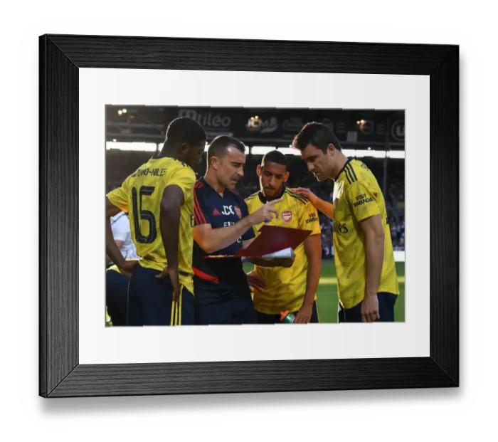Framed Print : Arsenal Coaches Guide Players During Angers Pre-Season Friendly Framed Print : Arsenal Coaches Guide Players During Angers Pre-Season Friendly