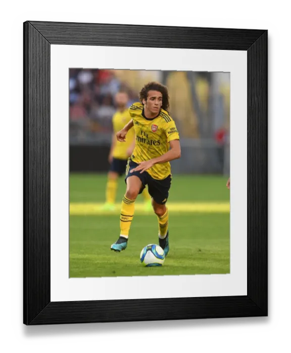 Framed Print : Guendouzi Stars: Arsenal's Pre-Season Triumph over Angers