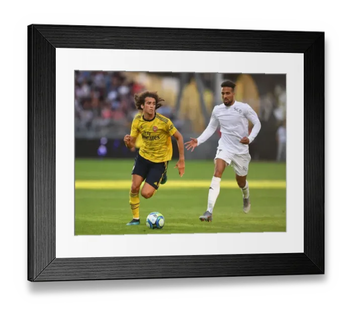 Framed Print : Guendouzi in Action: Angers vs. Arsenal Pre-Season Clash