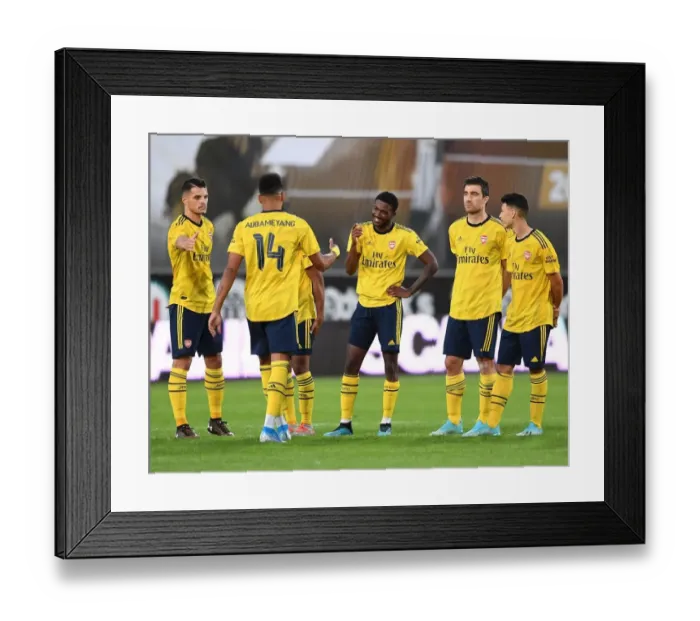 Framed Print : Angers vs Arsenal: Aubameyang and Maitland-Niles in Penalty Shootout (2019)