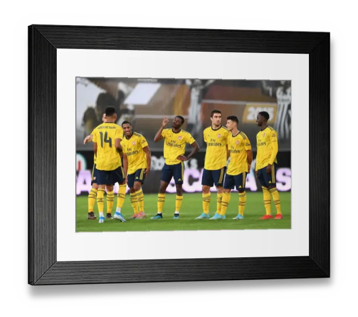 Framed Print : Aubameyang vs. Maitland-Niles: Dramatic Penalty Showdown – Angers vs. Arsenal (2019)