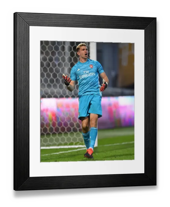 Framed Print : Emi Martinez Saves Penalty in Arsenal's Pre-Season Victory over Angers