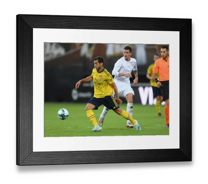 Framed Print : Mkhitaryan Shines: Arsenal's Dominant Display Against Angers Framed Print : Mkhitaryan Shines: Arsenal's Dominant Display Against Angers