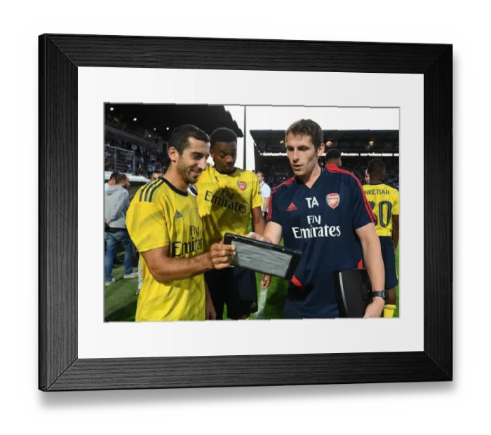Framed Print : Arsenal Players Mkhitaryan and Willock Review Match Stats Post-Match: Angers vs Arsenal (2019-20 Pre-Season Friendly)