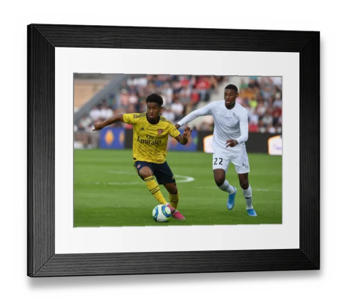 Framed Print : Clash of Young Talents: Nelson vs Reine-Adelaide in Arsenal's Pre-Season Battle against Angers