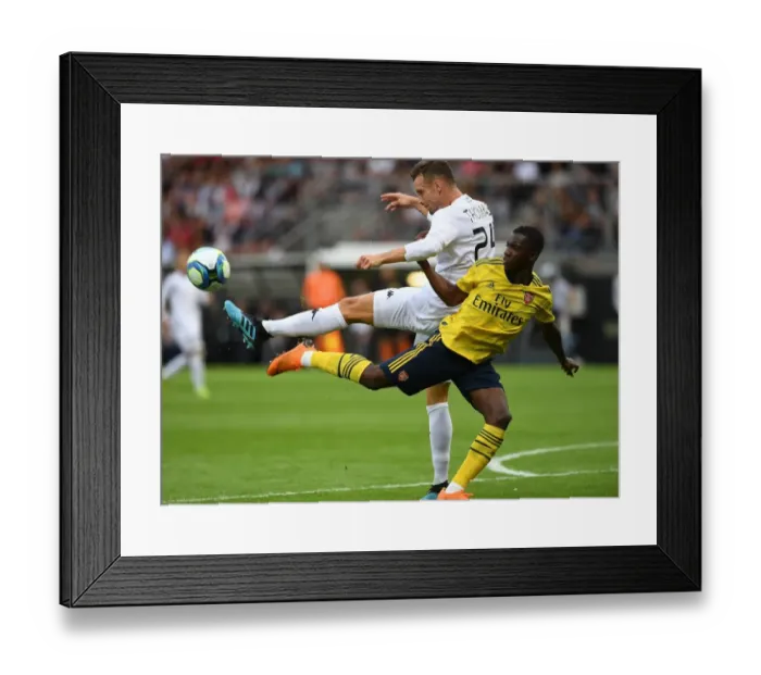 Framed Print : Angers vs. Arsenal: Eddie Nketiah Clashes with Romain Thomas in Pre-Season Friendly Framed Print : Angers vs. Arsenal: Eddie Nketiah Clashes with Romain Thomas in Pre-Season Friendly