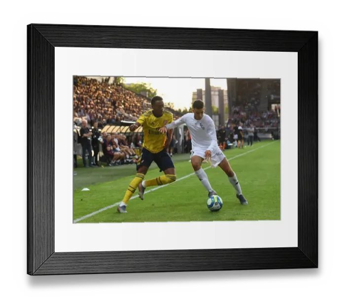 Framed Print : Arsenal's Joe Willock Faces Off Against Angers Rachid Alioui in 2019 Pre-Season Friendly