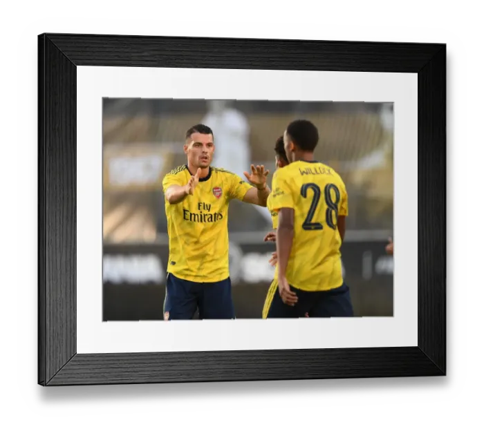 Framed Print : Arsenal's Granit Xhaka Celebrates Reiss Nelson's Goal Against Angers in 2019 Pre-Season Friendly Framed Print : Arsenal's Granit Xhaka Celebrates Reiss Nelson's Goal Against Angers in 2019 Pre-Season Friendly