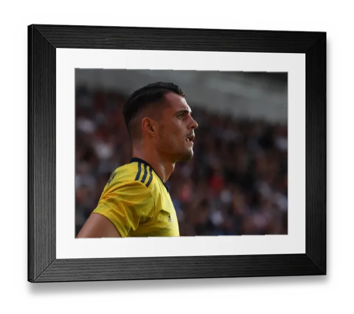 Framed Print : Granit Xhaka in Action: Angers vs. Arsenal Pre-Season Friendly, 2019 Framed Print : Granit Xhaka in Action: Angers vs. Arsenal Pre-Season Friendly, 2019