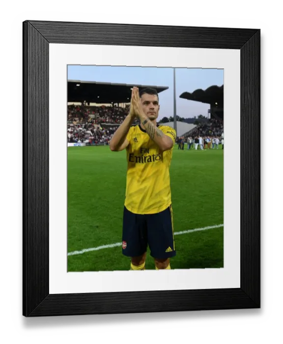 Framed Print : Granit Xhaka Applauds Arsenal Fans in Angers Friendly Win Framed Print : Granit Xhaka Applauds Arsenal Fans in Angers Friendly Win