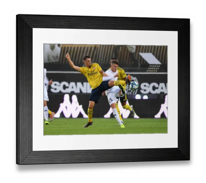Framed Print : Xhaka vs Capelle: Clash in Angers - Arsenal's Pre-Season Battle