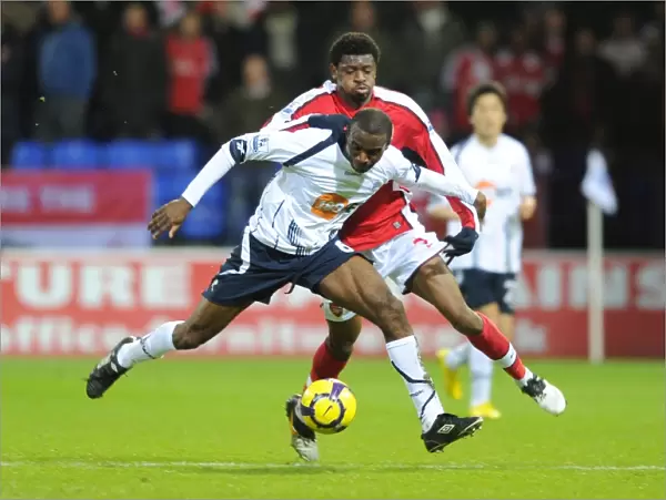 Abou Diaby and Fabrice Muamba Clash: Arsenal's Victory Over Bolton Wanderers in the Premier League