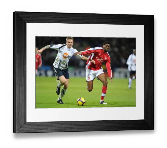 Framed Print : Abou Diaby and Matt Taylor Clash: Arsenal's Victory Over Bolton Wanderers (0:2) Framed Print : Abou Diaby and Matt Taylor Clash: Arsenal's Victory Over Bolton Wanderers (0:2)