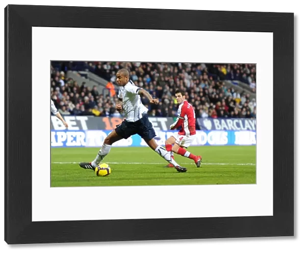 Cesc Fabregas shoots past Zat Knight to score the 1st Arsenal goal. Bolton Wanderers 0