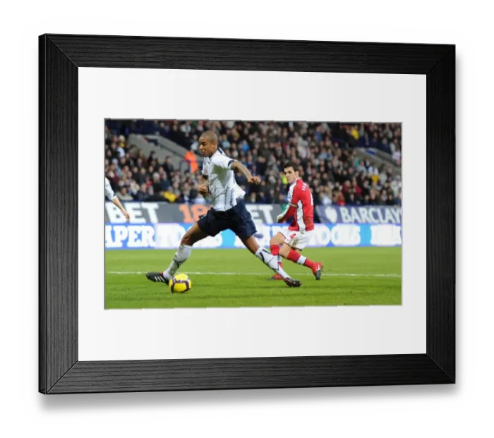 Framed Print : Cesc Fabregas shoots past Zat Knight to score the 1st Arsenal goal. Bolton Wanderers 0 Framed Print : Cesc Fabregas shoots past Zat Knight to score the 1st Arsenal goal. Bolton Wanderers 0