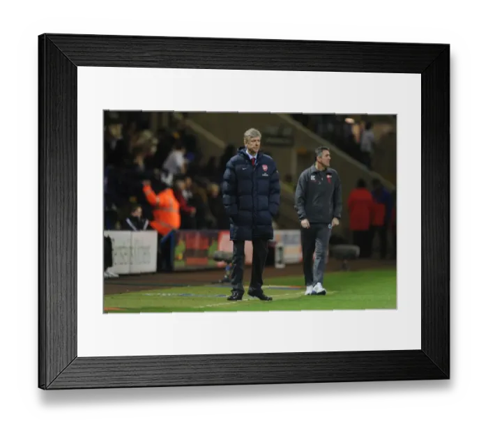 Framed Print : Managers : Arsene Wenger (Arsenal) and Owen Coyle (Bolton) during the match