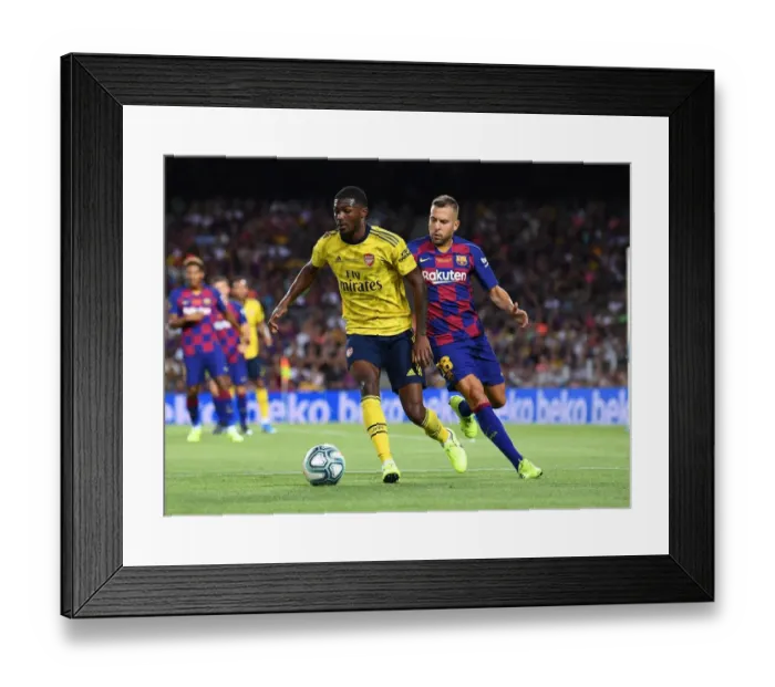 Framed Print : Clash of Titans: FC Barcelona vs. Arsenal - Ainsley Maitland-Niles vs. Jordi Alba
