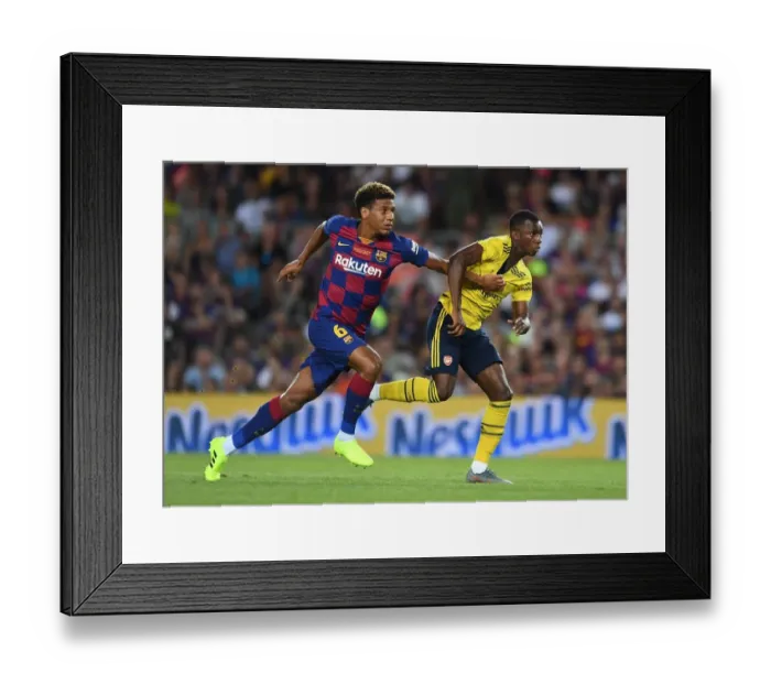 Framed Print : Clash at the Camp: FC Barcelona vs. Arsenal - Pre-Season Battle (2019-20): Eddie Nketiah vs. Jean-Clair Todibo