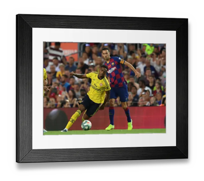 Framed Print : Clash of Titans: FC Barcelona vs. Arsenal - Joe Willock vs. Sergio Busquets