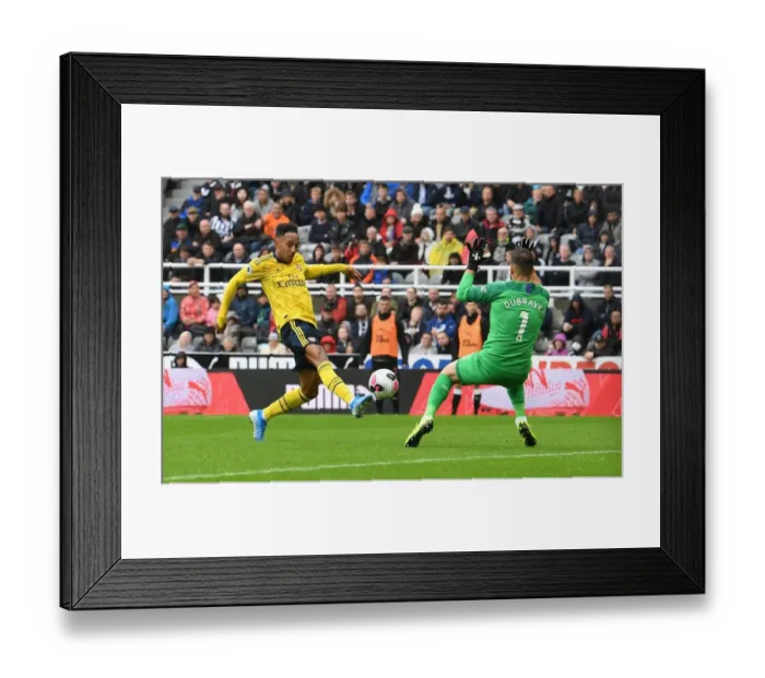 Framed Print : Aubameyang's Stunner: Arsenal's Dramatic Win Against Newcastle in Premier League